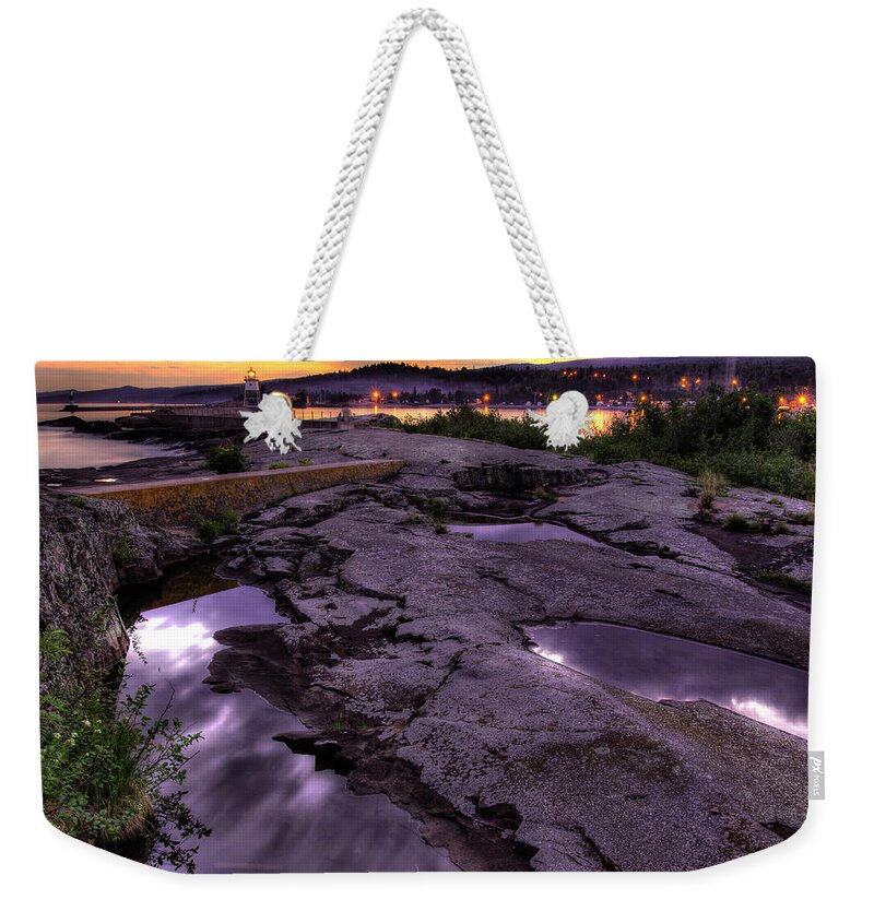 Bay Weekender Tote Bag featuring the photograph Grand Marais Lighthouse at Sunset by Jakub Sisak