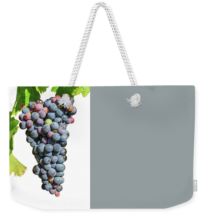 Red Grapes Weekender Tote Bag featuring the photograph Grapes on vine by Benny Marty