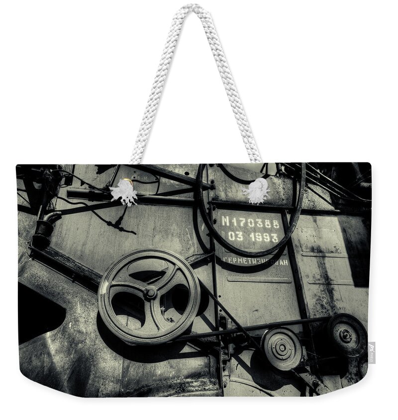Combine Weekender Tote Bag featuring the photograph Grey Monstrosity by John Williams