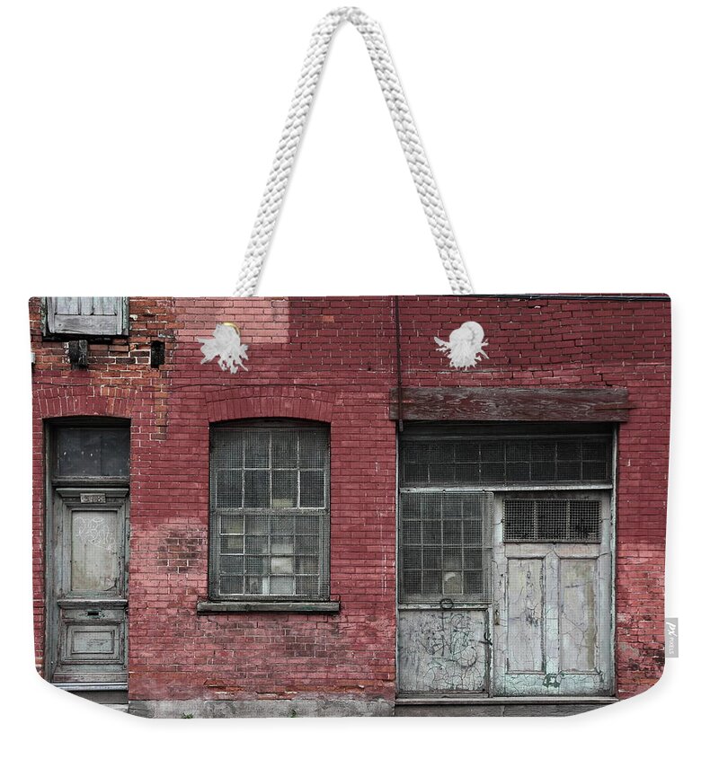 Decay Weekender Tote Bag featuring the photograph Griffintown Wall by Kreddible Trout