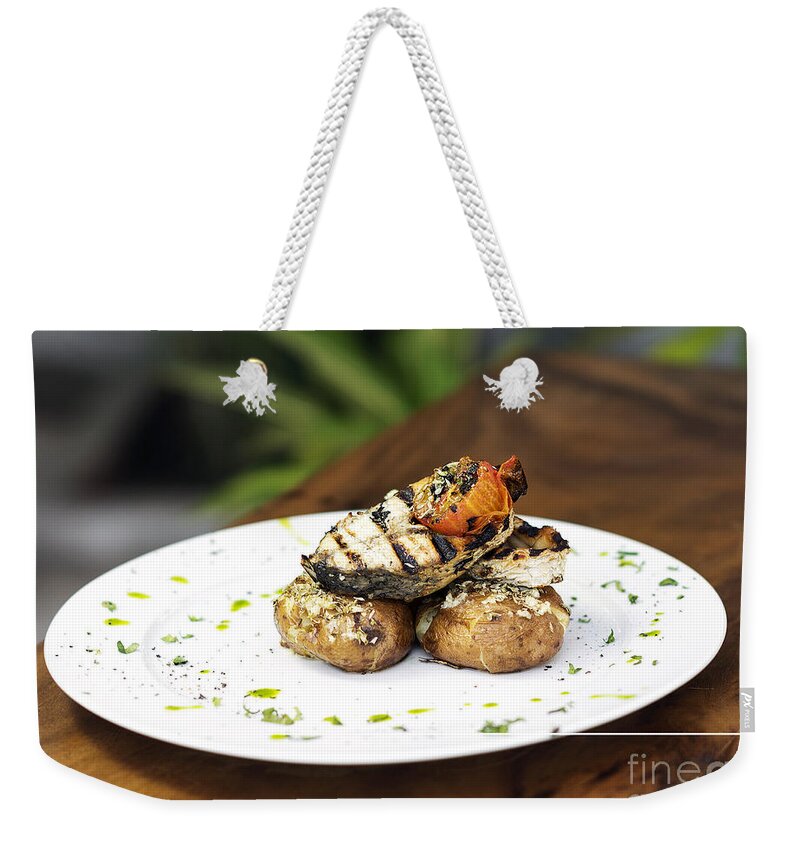 Barbecued Weekender Tote Bag featuring the photograph Grilled Fish With Roast Potato Herbs And Garlic by JM Travel Photography