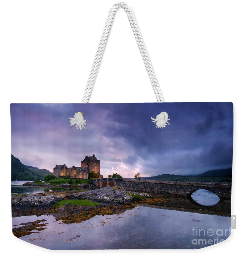 Castle Weekender Tote Bag featuring the photograph Guardian of the Lake by David Lichtneker
