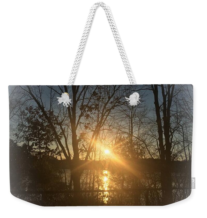Light Weekender Tote Bag featuring the photograph Guiding Light by Lisa Pearlman