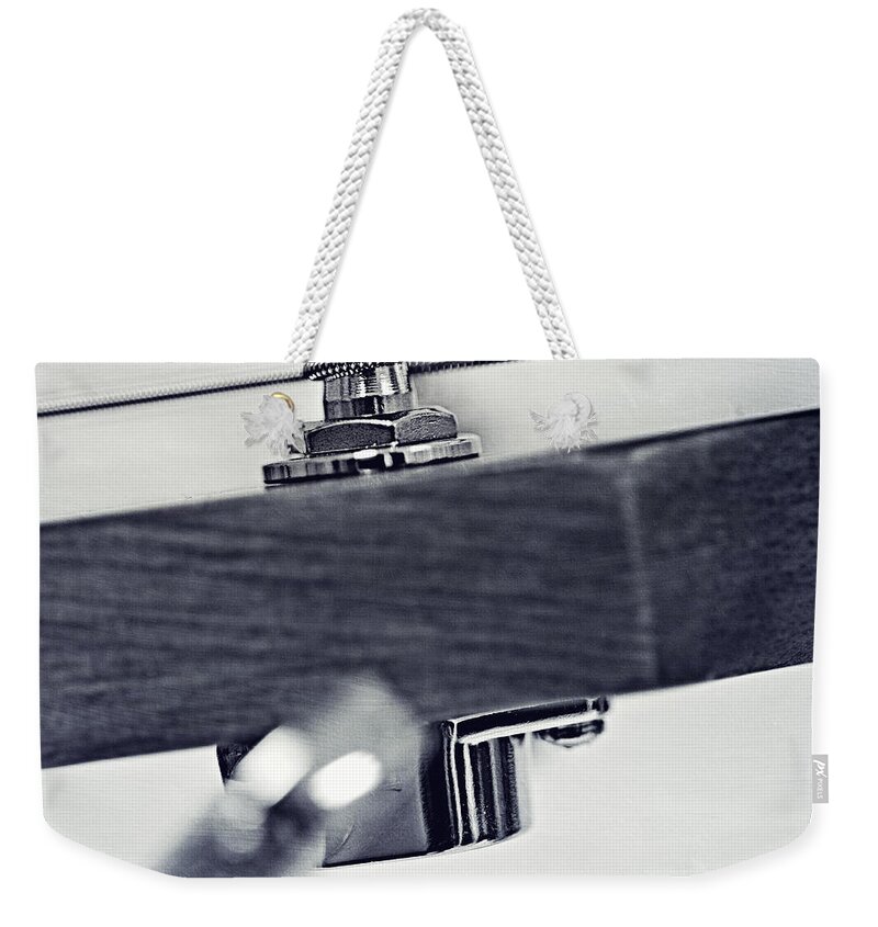 Black Weekender Tote Bag featuring the photograph guitar V by Priska Wettstein