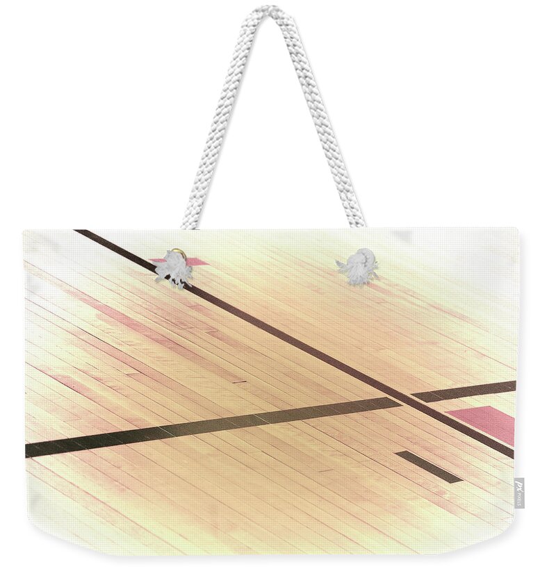 Gym Weekender Tote Bag featuring the photograph Gym Floor by Troy Stapek