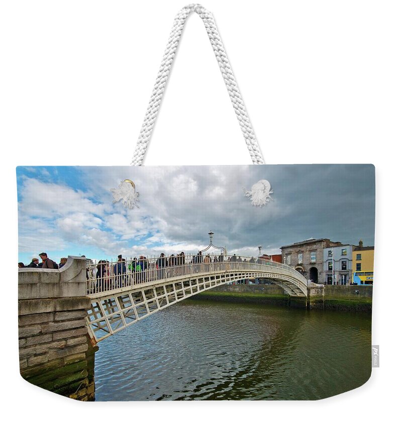 Dublin Weekender Tote Bag featuring the photograph Ha' Penny Bridge in Dublin by Marisa Geraghty Photography