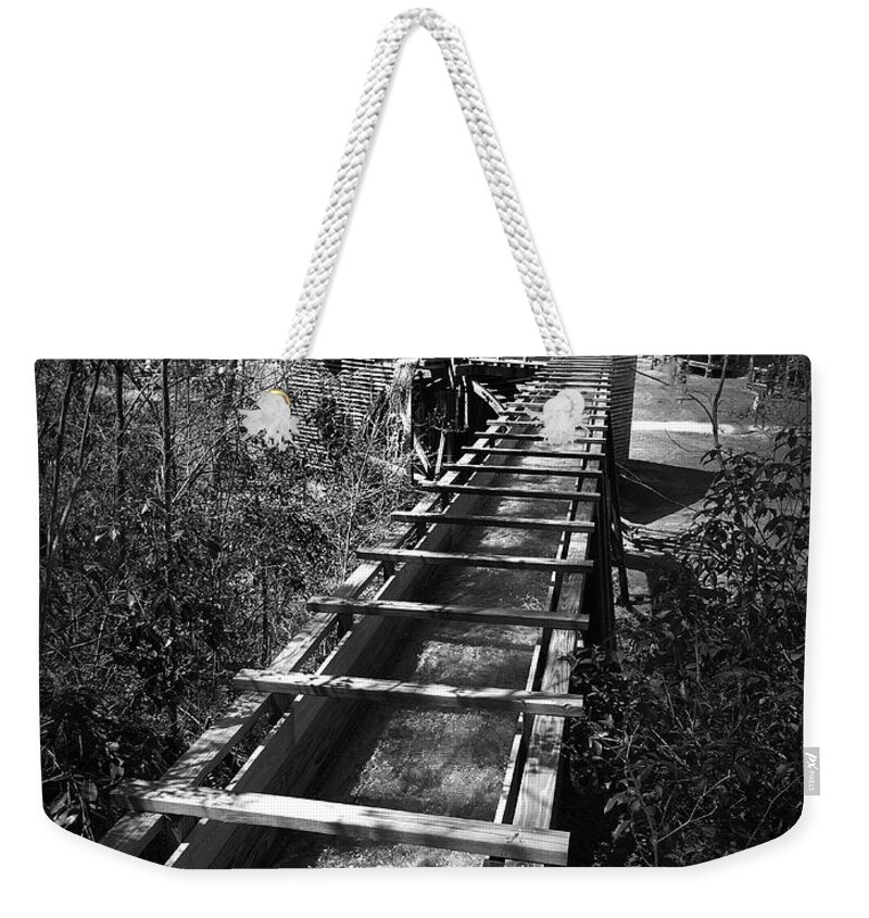 Kelly Hazel Weekender Tote Bag featuring the photograph Hagood Gristmill Waterwheel at Hagood Mill by Kelly Hazel