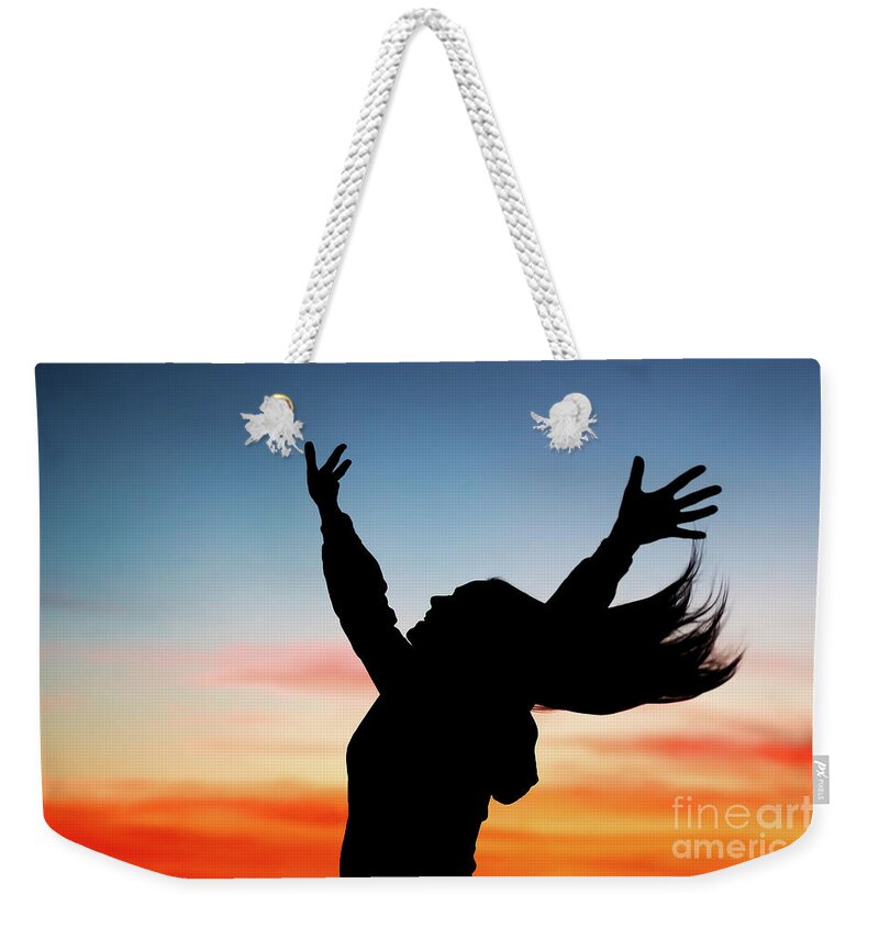 Active Weekender Tote Bag featuring the photograph Happy woman enjoying sunset by Anna Om