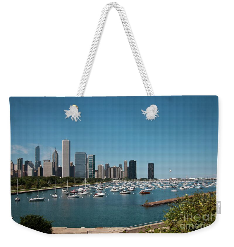 American Cities Weekender Tote Bag featuring the photograph Harbor Parking in Chicago by David Levin