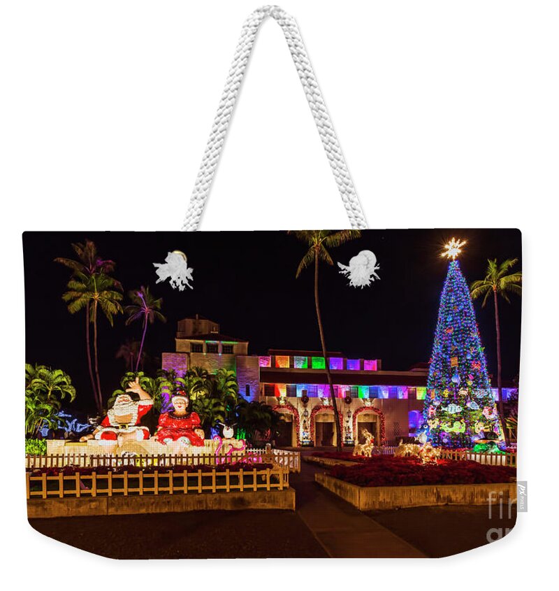 Mele Kalikimaka Merry Christmas Weekender Tote Bag featuring the photograph Hawaiian Santa and Christmas Tree by Aloha Art