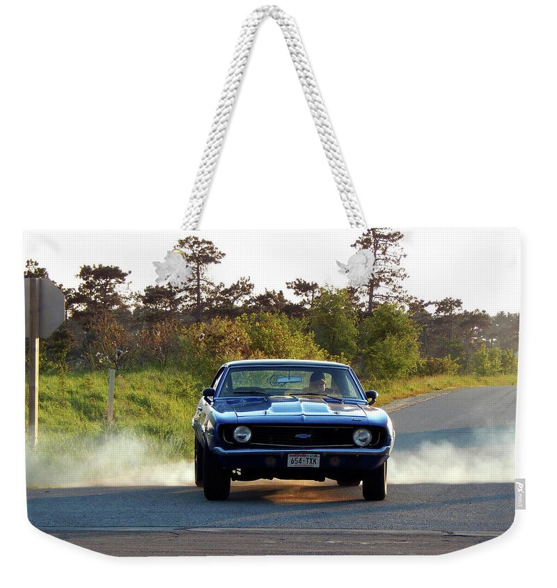 Spring Weekender Tote Bag featuring the photograph He Took Off ... by Wild Thing