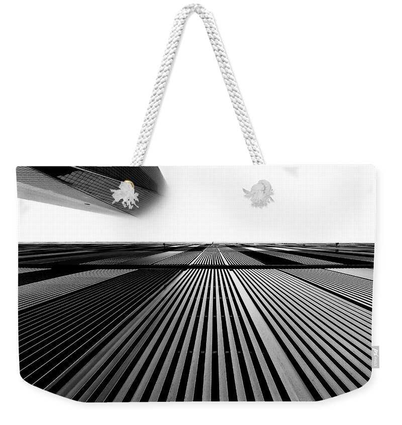 Black And White Weekender Tote Bag featuring the photograph Head in the Clouds 1 by Rand Ningali