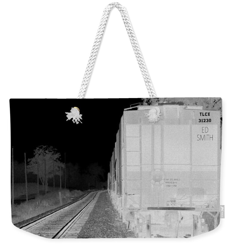 Heat Of The Night Weekender Tote Bag featuring the photograph Heat of the Night by Edward Smith