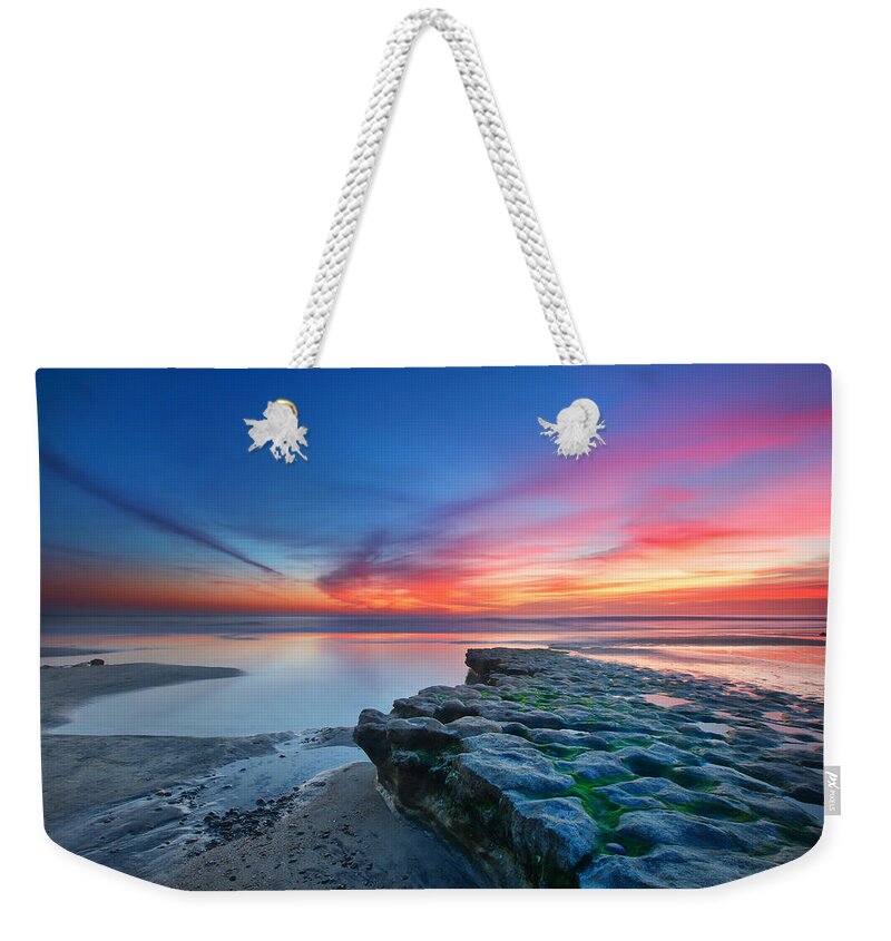 Sunset Weekender Tote Bag featuring the photograph Heaven and Earth by Larry Marshall