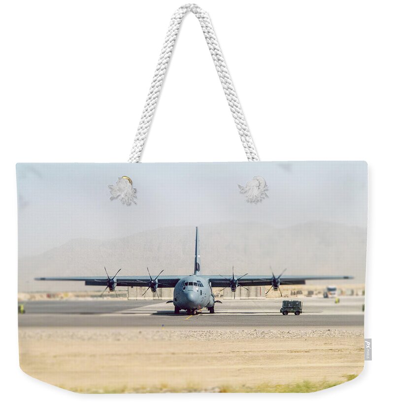 Apu Weekender Tote Bag featuring the photograph Hercules C-130 on Runway by SR Green