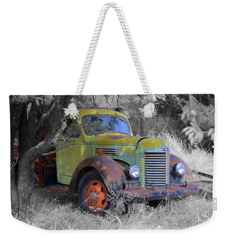 Rusty Weekender Tote Bag featuring the photograph Hiding Truck by Richard J Cassato