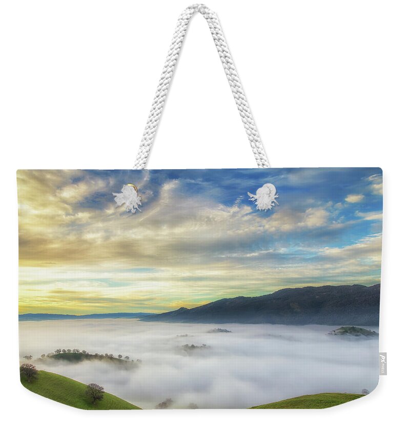 Landscape Weekender Tote Bag featuring the photograph High Clouds Above Fog by Marc Crumpler