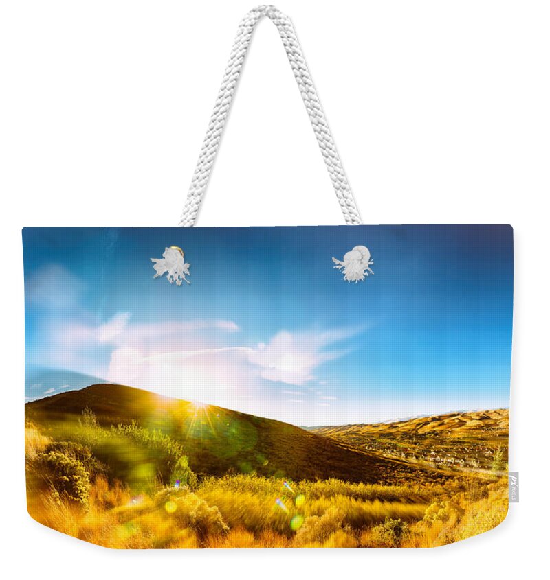 Reno Weekender Tote Bag featuring the photograph High Desert Autumn Sunset with Double Exposure, Warm Tones and Lens Flare by Brian Ball
