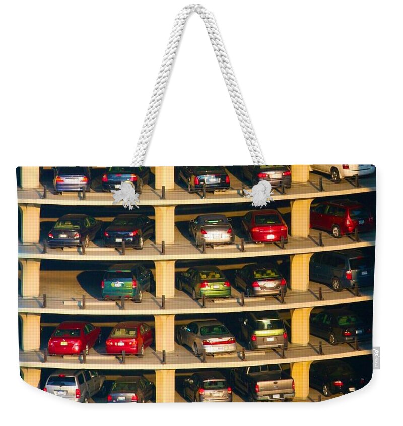 Buildings Weekender Tote Bag featuring the photograph Highrise Carpark by Polly Castor