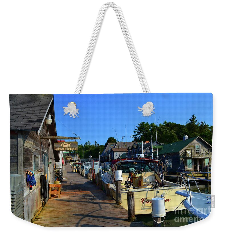 Michigan Weekender Tote Bag featuring the photograph Historic Fishtown Leland by Amy Lucid