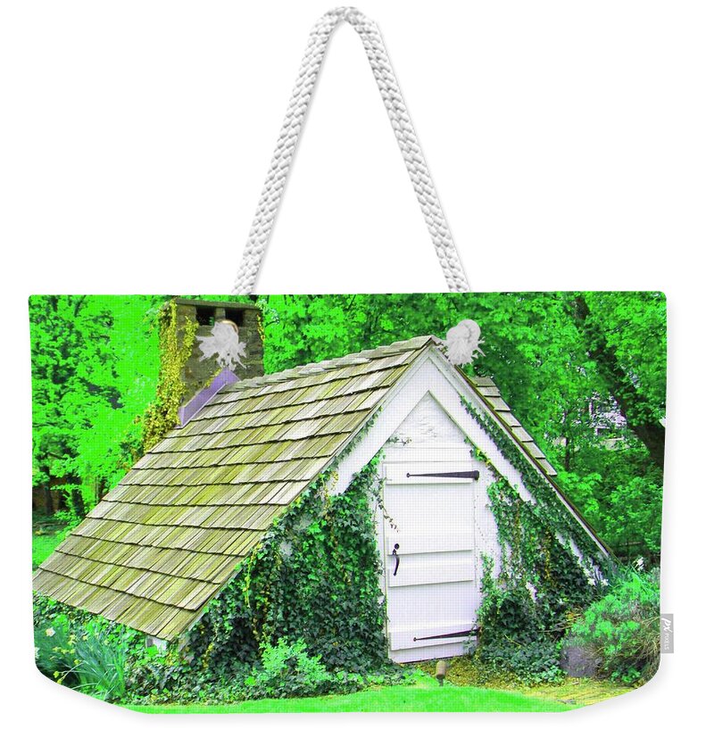 Newhope Weekender Tote Bag featuring the photograph Hobbit Hut by Susan Carella
