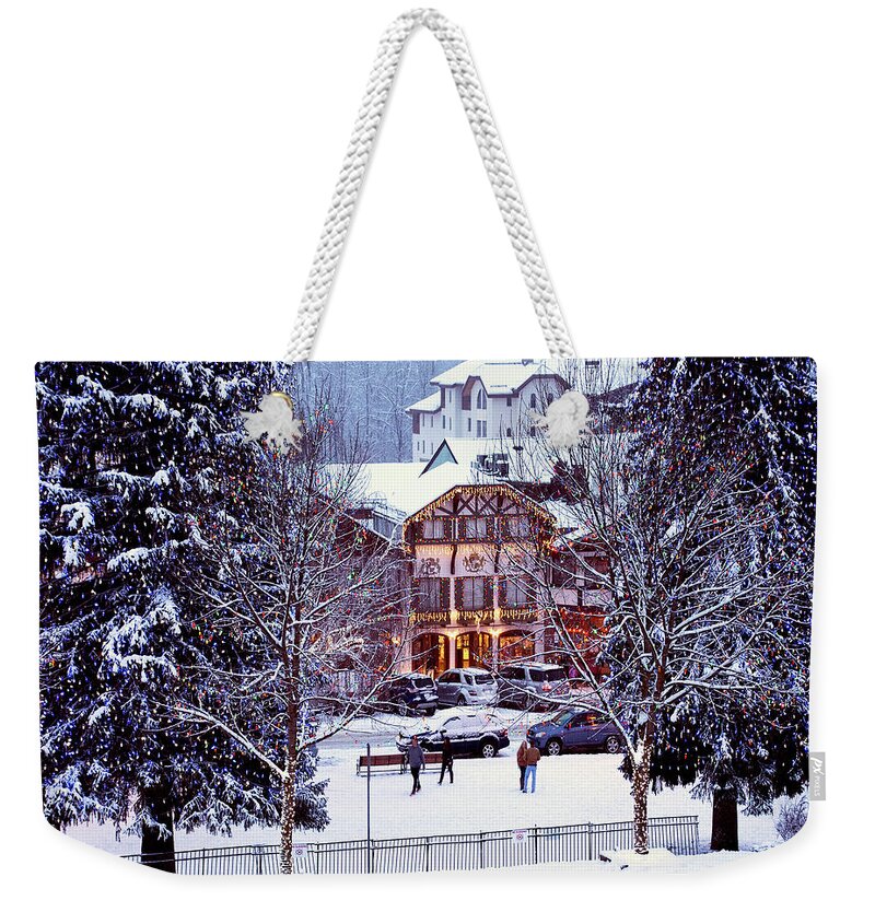 Holiday Weekender Tote Bag featuring the photograph Holiday in the Village by Greg Sigrist