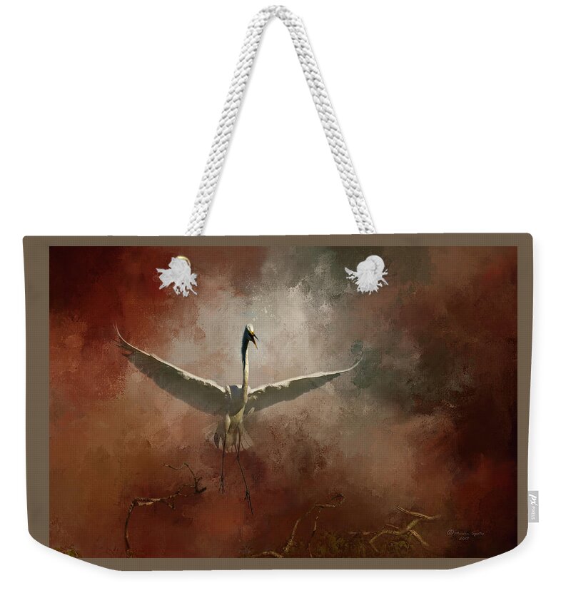Bird Weekender Tote Bag featuring the photograph Home Coming by Marvin Spates