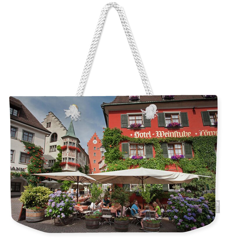 Streetview Weekender Tote Bag featuring the photograph Hotel Lowen-weinstube by Aivar Mikko