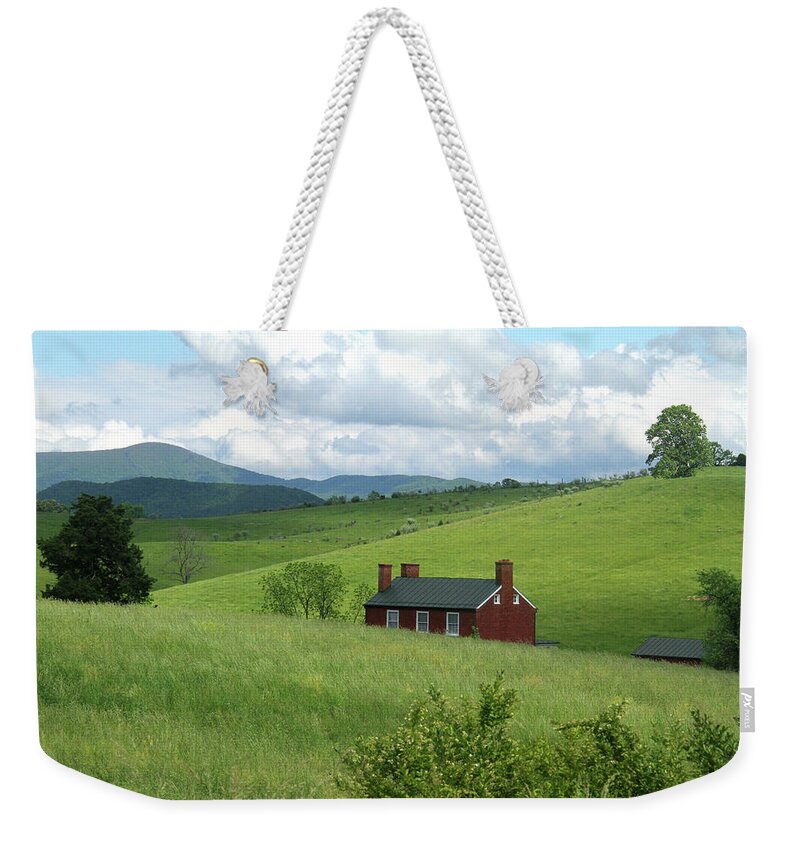 Grass Weekender Tote Bag featuring the photograph House in the hills by Emanuel Tanjala