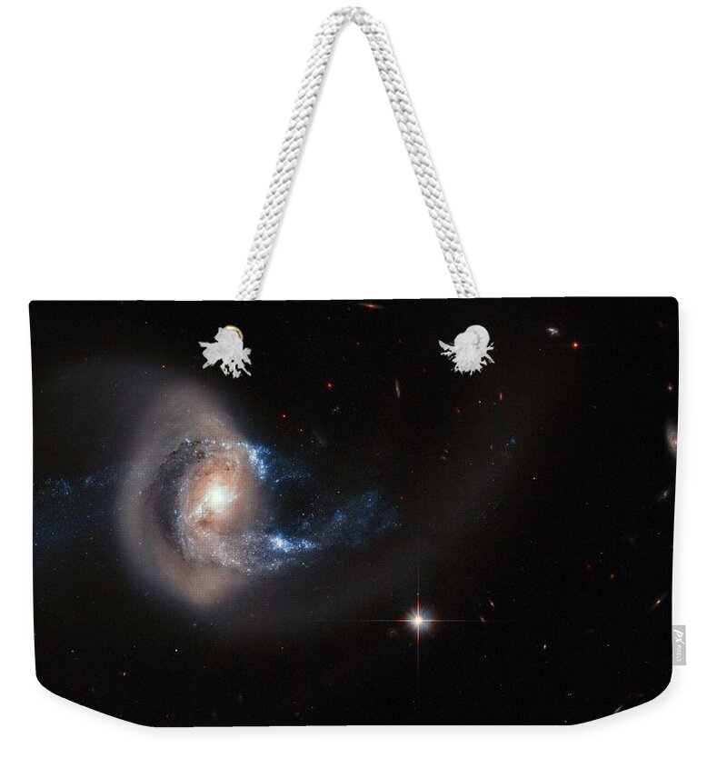 Nebula Weekender Tote Bag featuring the painting Hubble image of NGC 7714 by Celestial Images