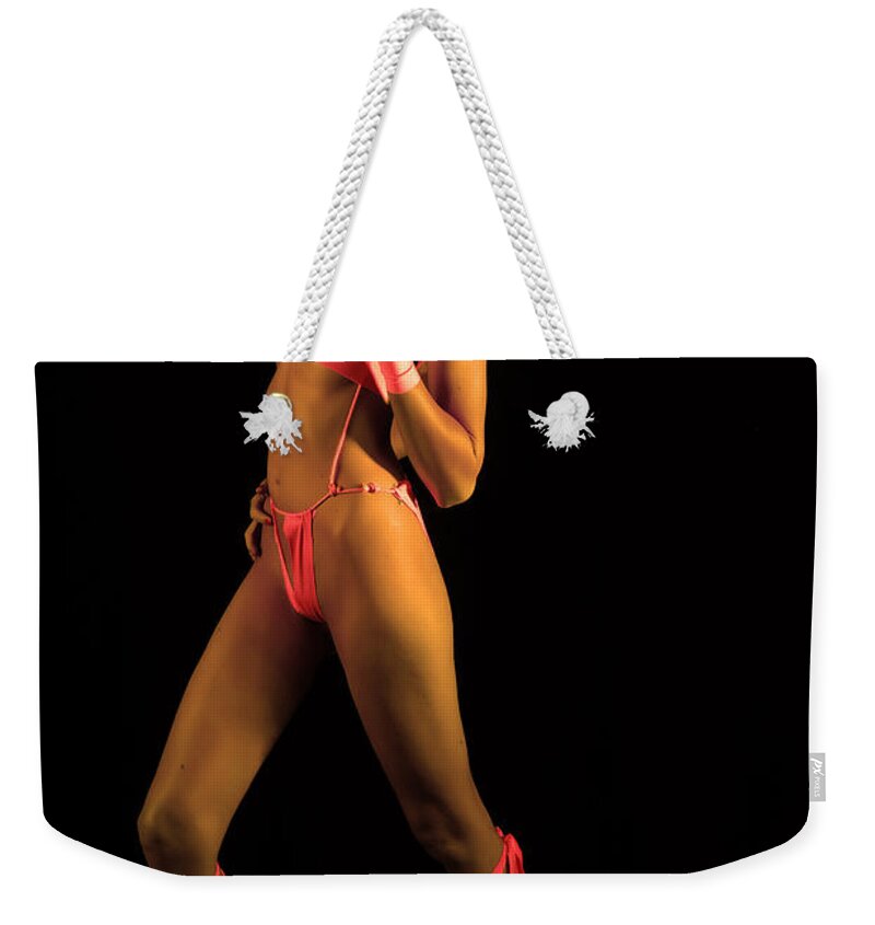 Glamour Photographs Weekender Tote Bag featuring the photograph Hunter by Robert WK Clark