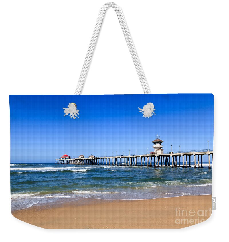 America Weekender Tote Bag featuring the photograph Huntington Beach Pier in Orange County California by Paul Velgos