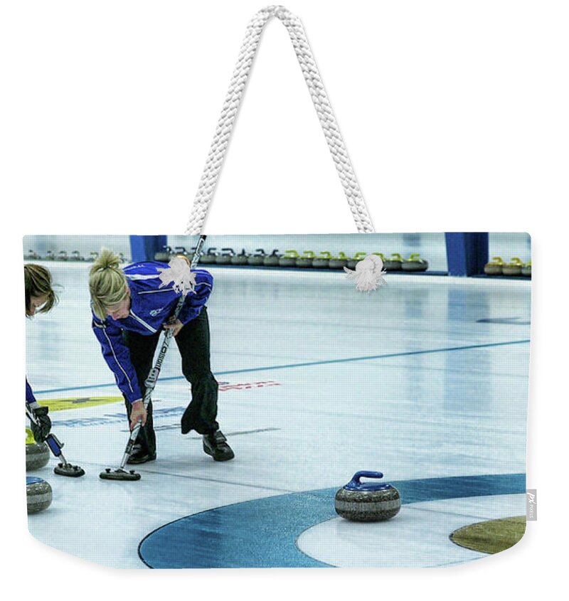 Curling Weekender Tote Bag featuring the photograph Hurry Hard by Lawrence Christopher