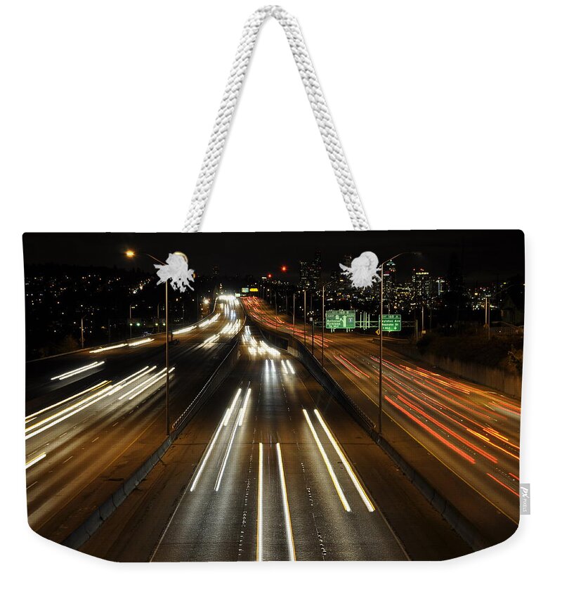 Night Weekender Tote Bag featuring the photograph I-5 at Night by Pelo Blanco Photo