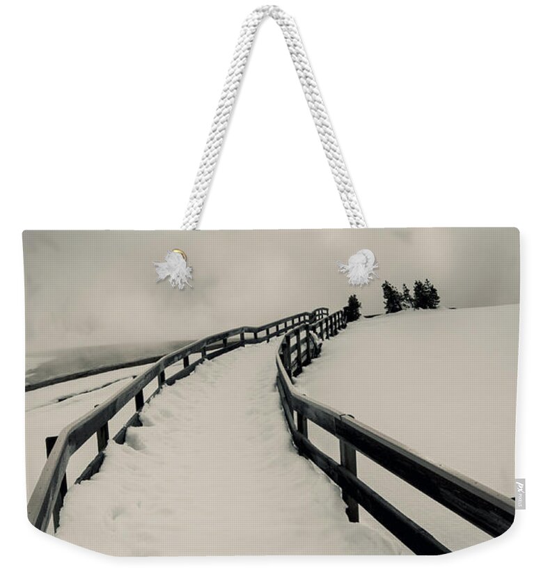 Winter Weekender Tote Bag featuring the photograph Ice and Fire by David Lichtneker