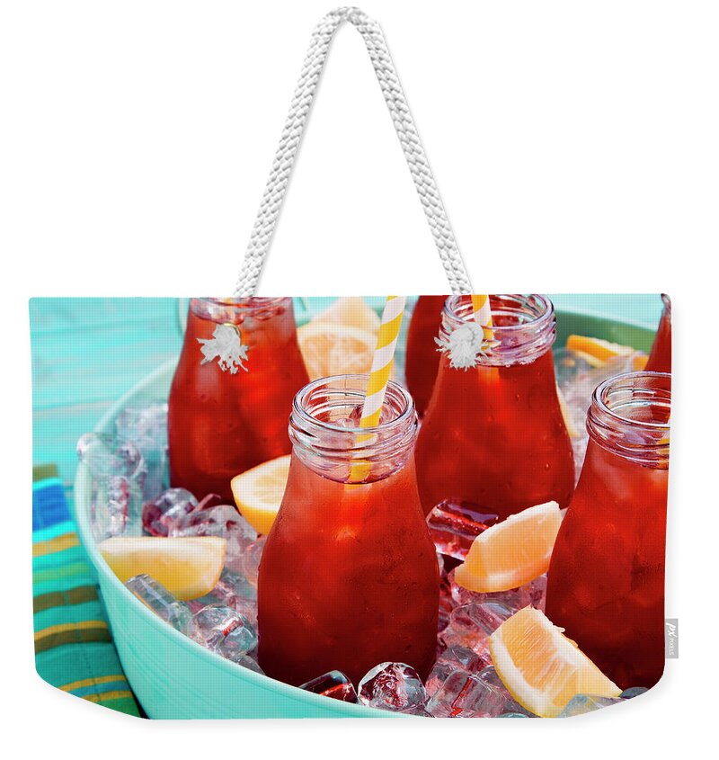 Background Weekender Tote Bag featuring the photograph Iced Teas with Straws by Teri Virbickis