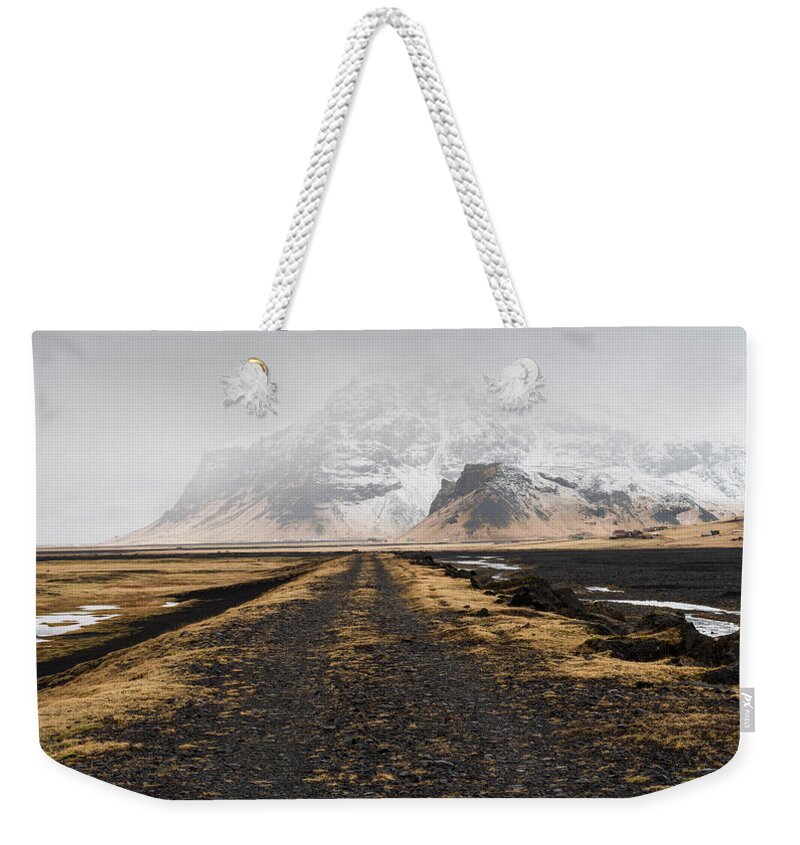 Iceland Weekender Tote Bag featuring the photograph Icelandic mountain winter landscape by Michalakis Ppalis
