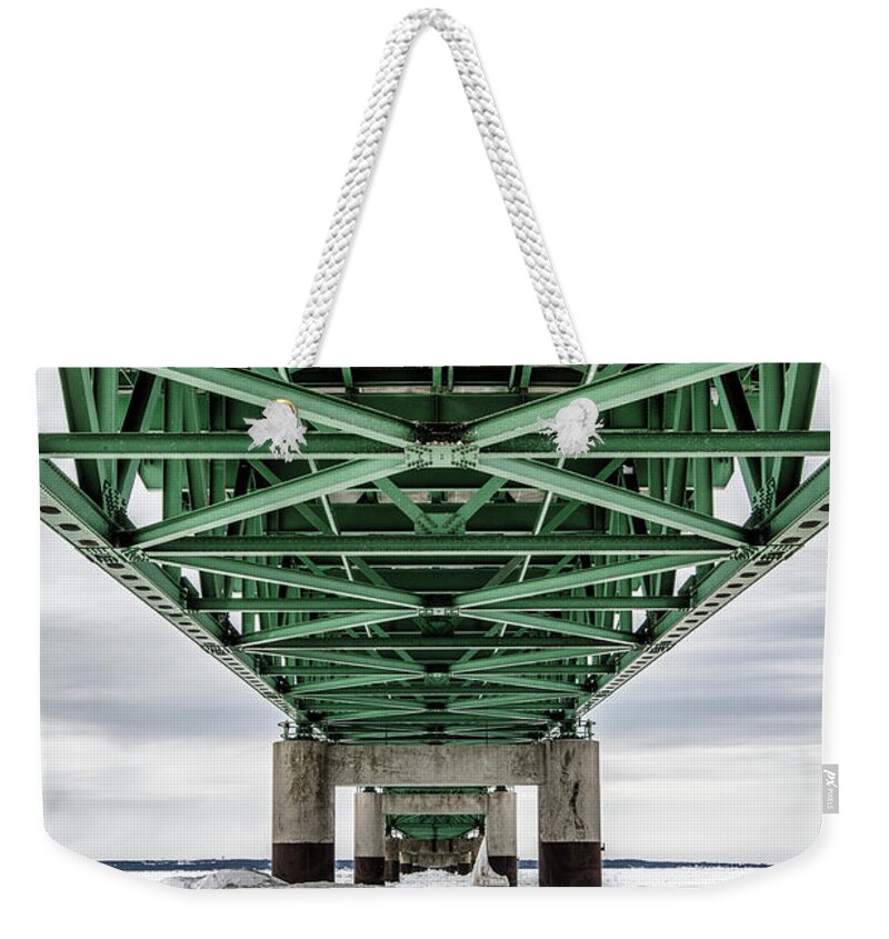 John Mcgraw Weekender Tote Bag featuring the photograph Icy Mackinac Bridge in Winter by John McGraw