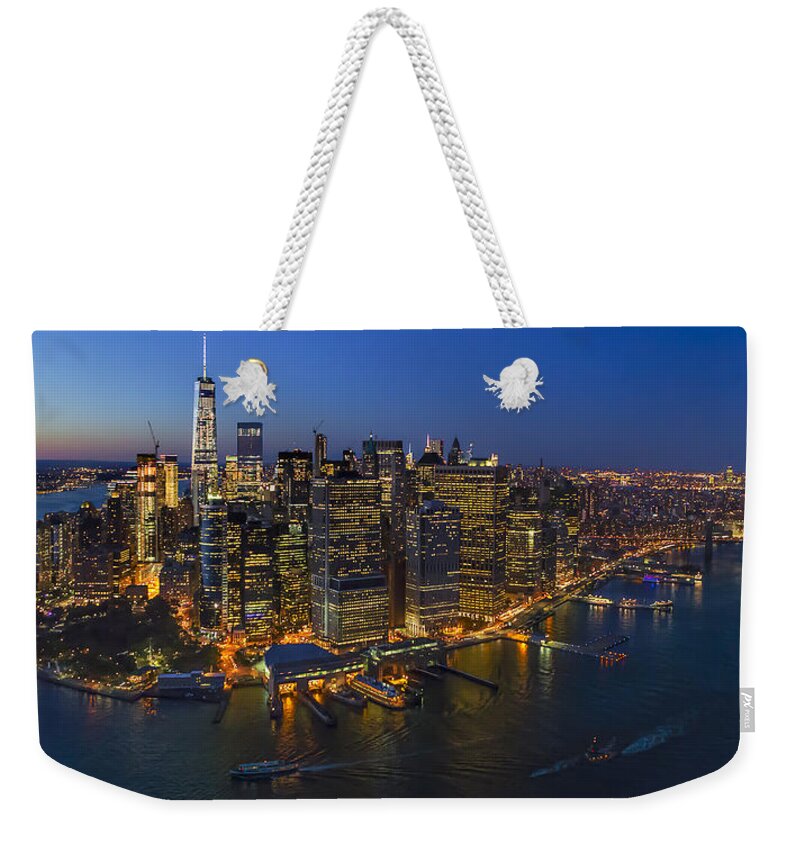 Aerial View Weekender Tote Bag featuring the photograph Illuminated Lower Manhattan NYC by Susan Candelario