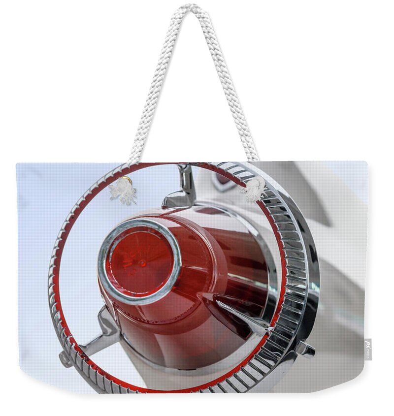 Chrysler Weekender Tote Bag featuring the photograph Imperial Taillight by Dennis Hedberg