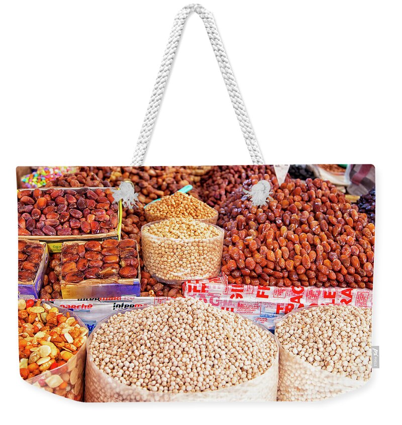 Africa Weekender Tote Bag featuring the photograph In a market hall of the african harbor city Agadir in Morocco by Gina Koch