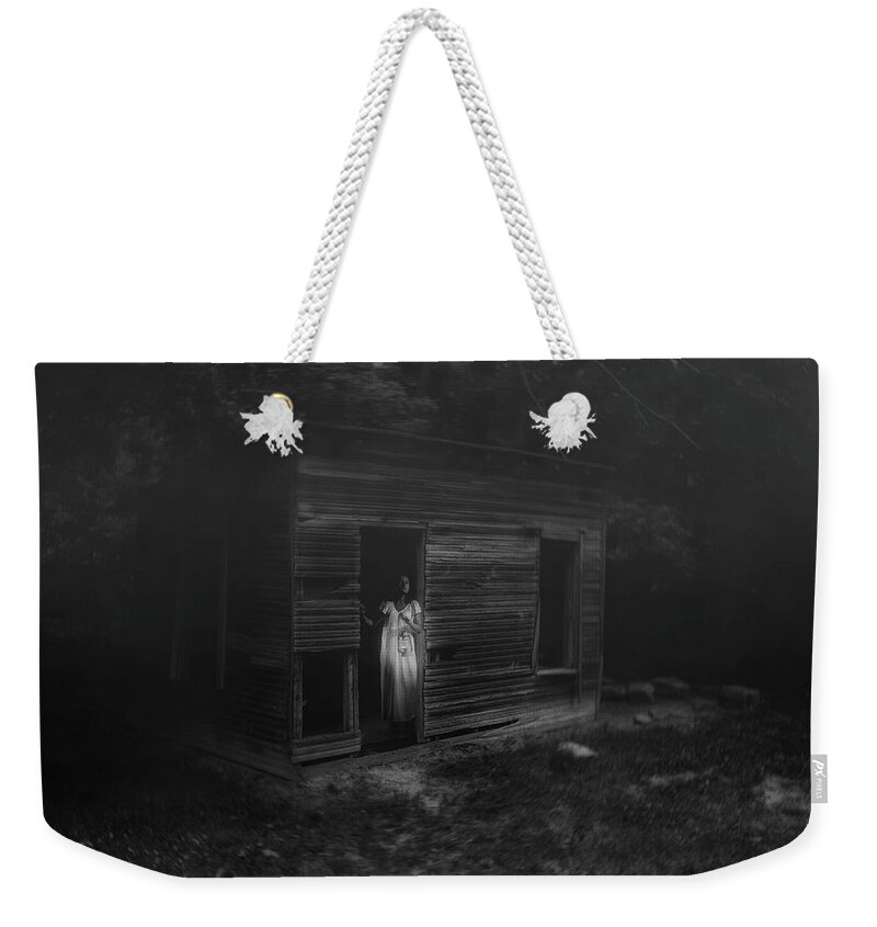 Woman Weekender Tote Bag featuring the photograph In Fear She Waits by Tom Mc Nemar