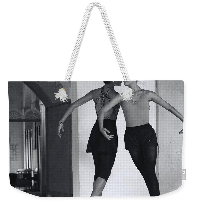 Cuba Weekender Tote Bag featuring the photograph In Sync by Mary Buck