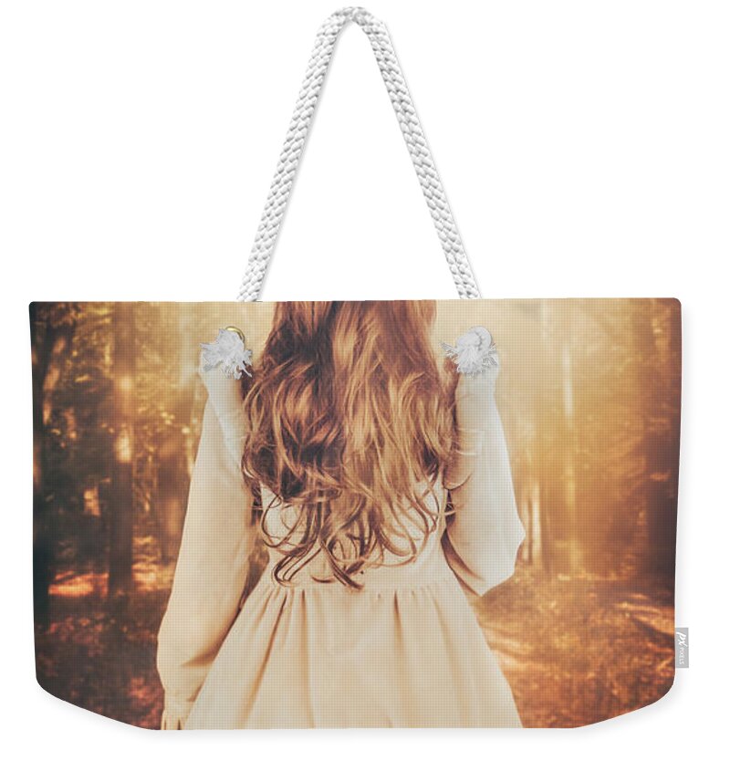  Weekender Tote Bag featuring the photograph In the park by Jaroslaw Blaminsky