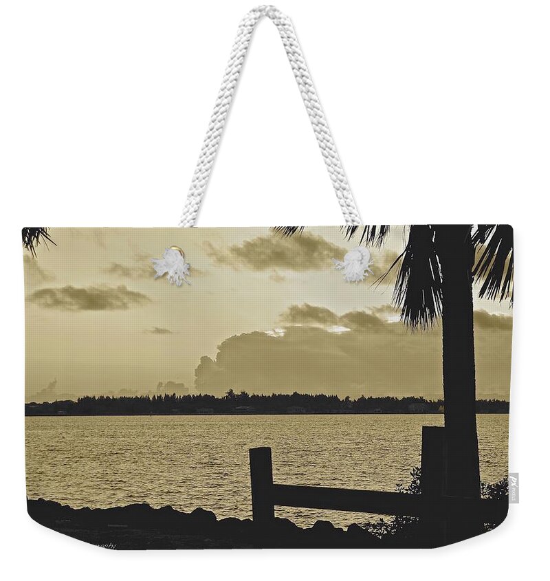 Sepia Weekender Tote Bag featuring the photograph Indian River Sunset by Carol Bradley