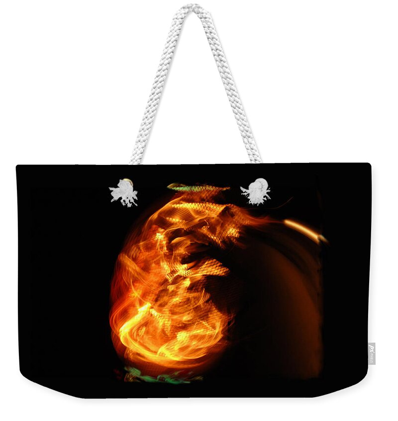 Fire Weekender Tote Bag featuring the photograph Infant Flame by Donna Blackhall