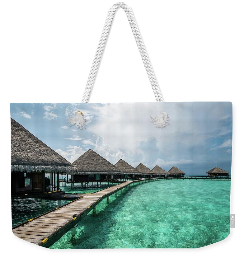 Maldives Weekender Tote Bag featuring the photograph Inhale by Hannes Cmarits