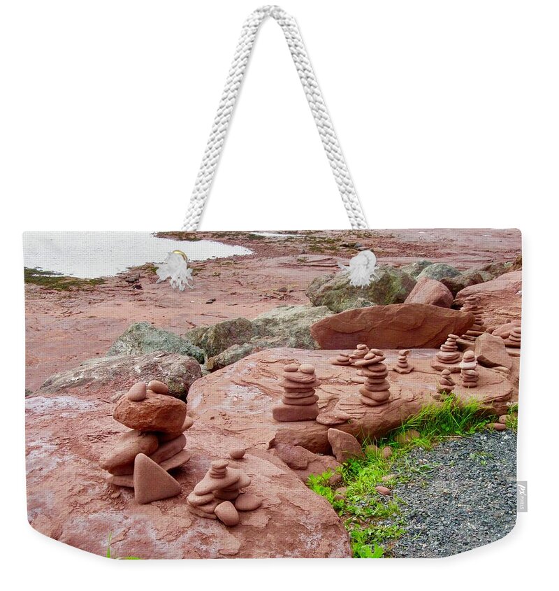 Rocks Weekender Tote Bag featuring the photograph Inuksuks by Stephanie Moore