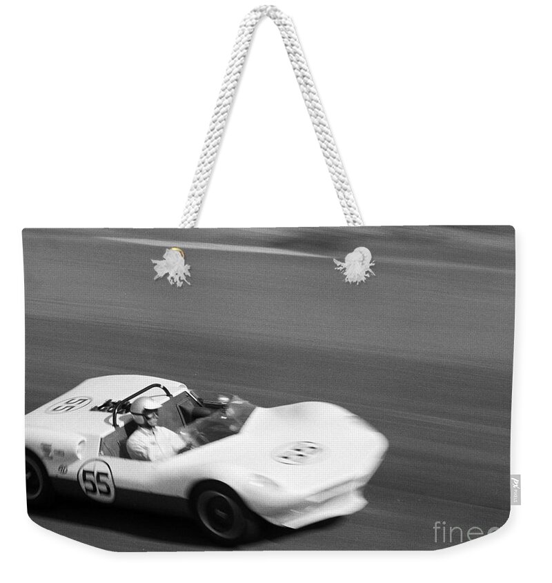 Jim Hall Weekender Tote Bag featuring the photograph JimHall in Chaparral 63 Laguna Seca by Robert K Blaisdell