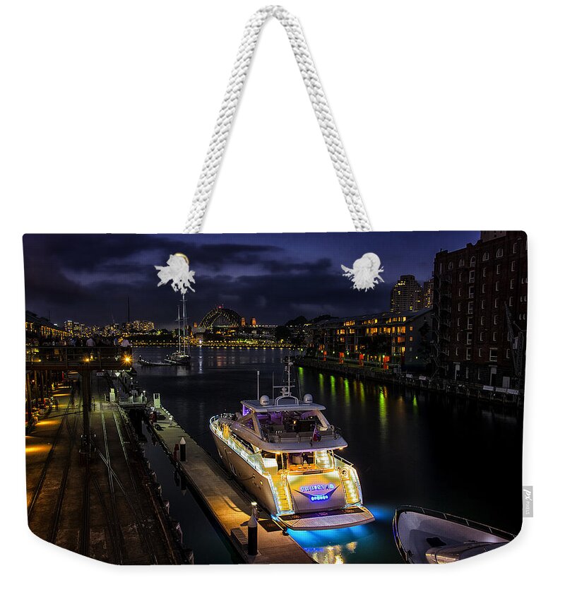 Jones Bay Weekender Tote Bag featuring the photograph Jones Bay Wharf by Andrei SKY